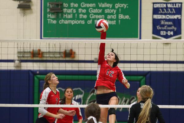 Coronado’s Brooke Garlick (12) hits the ball during the Cougars’ 3-2 win over Pa ...