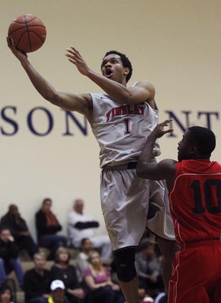 Findlay Prep’s Rashad Vaughn (1) soars to the basket past Planet Athlete’s Regin ...