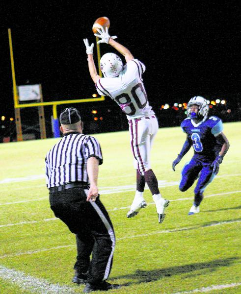 Desert Oasis’ Shawn Sanchez (80) attempts to catch a pass in front of Canyon Springs&# ...