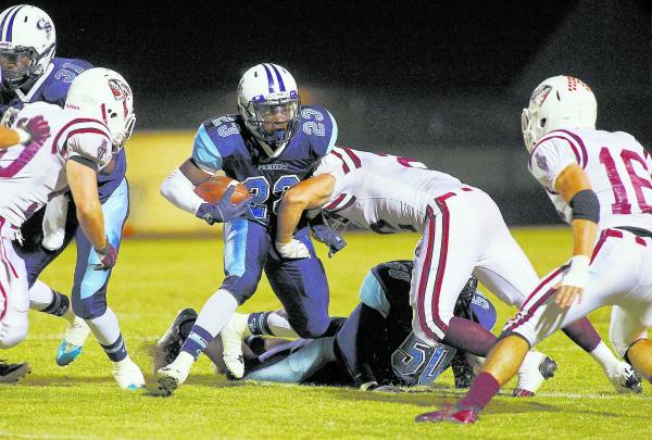 Canyon Springs’ Zaviontay Stevenson (23) tries to avoid Desert Oasis’s Gary Abde ...