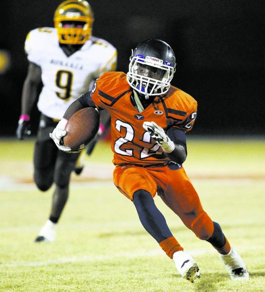 Legacy’s DeMichael Walker (22) gets loose for a big gain as Bonanza’s Anthony Ha ...