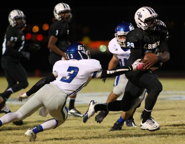 Canyon Springs’ Gregory Banks gets past Green Valley’s Jacob Tomlin on Thursday. ...