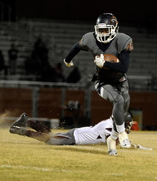 Legacy’s Casey Hughes carries the ball on Friday night against Cimarron-Memorial. Hugh ...