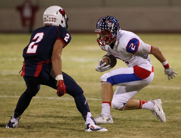 Liberty’s Drew Hladek (2) looks to get past Coronado’s Wade Jacobs (2) on Friday ...