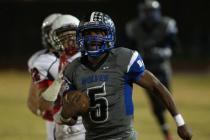 Basic’s Antraye Johnson gets past Coronado to score a touchdown on Friday. Johnson rus ...