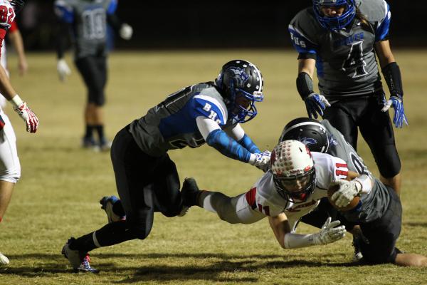 Coronado’s Tanner Gorski dives forward as he’s tackled on Friday.