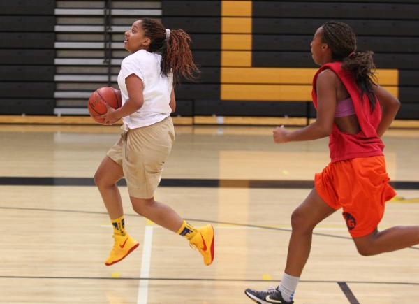 Clark senior Bre Belsar drives the ball against sophomore Karlicia Stroughter during practic ...