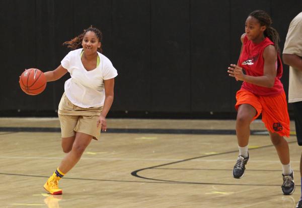 Clark senior Bre Belsar drives the ball against sophomore Karlicia Stroughter during practic ...