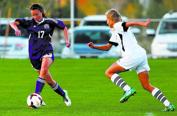 Silverado’s Taylor Petrillo guides the ball past Foothill’s Valerie Arrasate dur ...