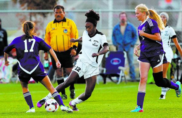 Foothill’s Verondrea Austin, left, battles for the ball against Silverado’s Sidn ...