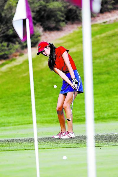 Coronado senior Olivia Greenwald chips out of the sand at a recent practice. Greenwald finis ...