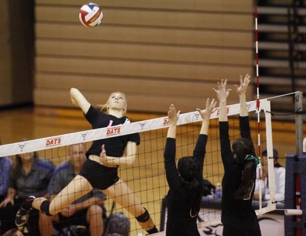 Bishop Gorman’s Francesca Manz (14) goes for a spike against Palo Verde during the cha ...