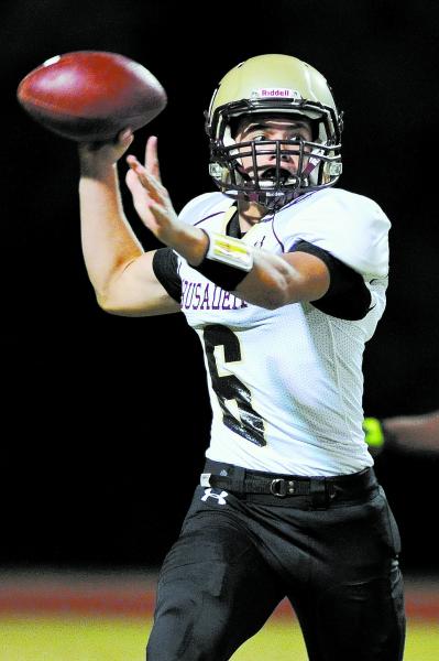 Faith Lutheran’s Jacob Deaville (6) looks for a receiver agains Mojave on Friday. Deav ...