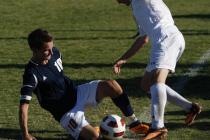 Legacy midfielder Luka Skrinjaric, left, goes for a slide tackle agains Palo Verde’s & ...