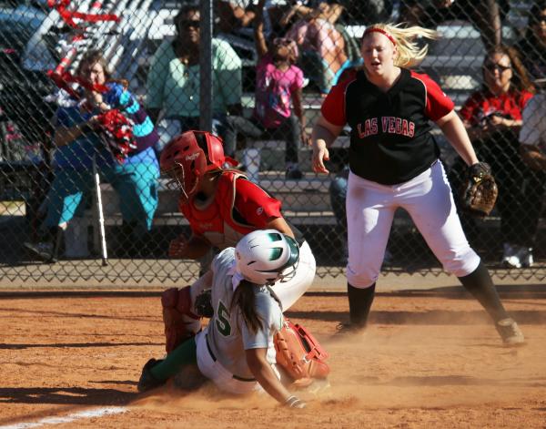 Green Valley’s Megan Barrera slides home safely as Las Vegas catcher Kali Brockett tri ...