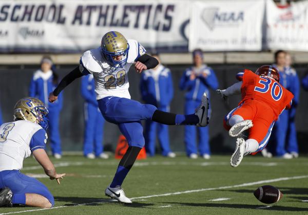 Bishop Gorman’s Dylan Weldon (30) blocks a field goal attempt by Reed’s Jesse Br ...