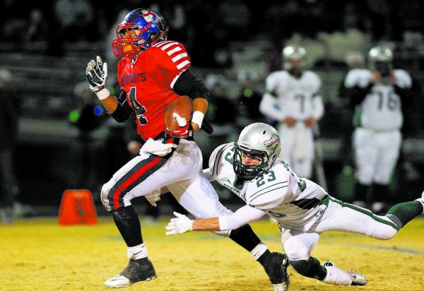 Liberty’s Ethan Tuilagi (4) tries to run past Green Valley’s Albert Lake. Tuilag ...