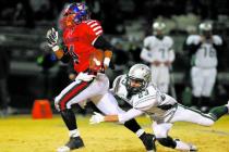 Liberty’s Ethan Tuilagi (4) tries to run past Green Valley’s Albert Lake. Tuilag ...