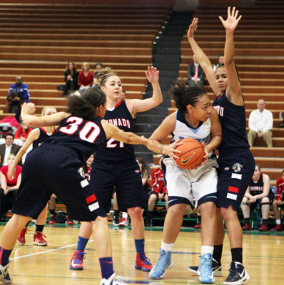 Coronado’s Dajah Washington (30), Skylar Feldman (21) and Ashley Johnson (5) box in Ca ...