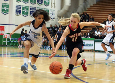 Canyon Springs’ Mandy Chitwood (5) battles Coronado’s Lexi Melone in their Sunri ...