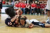 Coronado’s Sofie Cruz (23) battles for a jump ball with Canyon Springs’ Mandy Ch ...