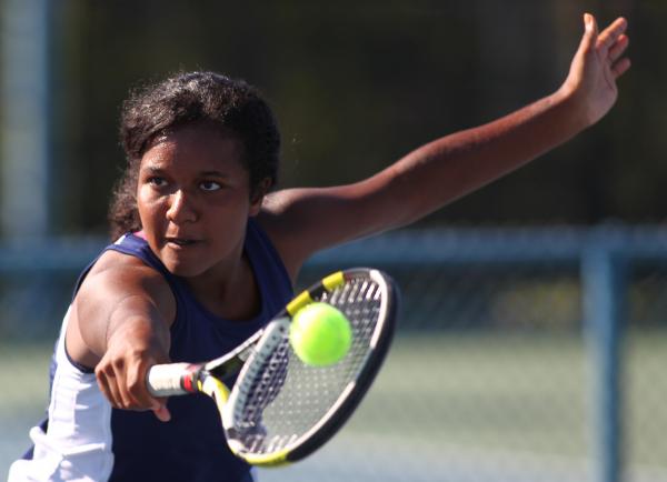 Coronado’s Paris Reese looks hits a backhand during her set with Green Valley’s ...