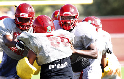 Arbor View High School football player Elijah George, right, is seen during practice at the ...