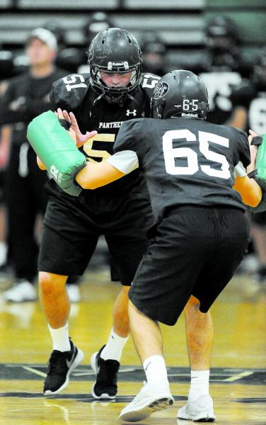 Palo Verde lineman Griffin Kemp (51) runs drills during practice on Friday.