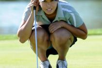 Cimarron-Memorial’s Aspen Bryant eyes her shot before putting during the Sunset Region ...