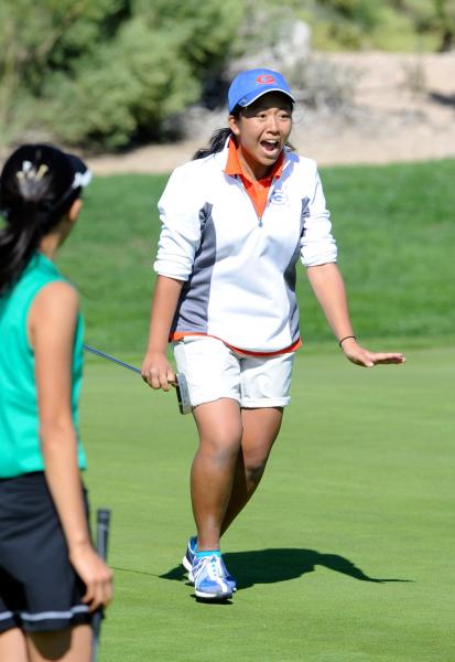 Bishop Gorman’s Katie DeJesus reacts after making a birdie on the third hole of the Su ...