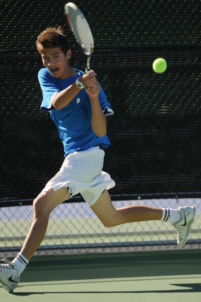 Bishop Gorman’s Dylan Leavitt chases down a backhand in the Sunset Region singles titl ...