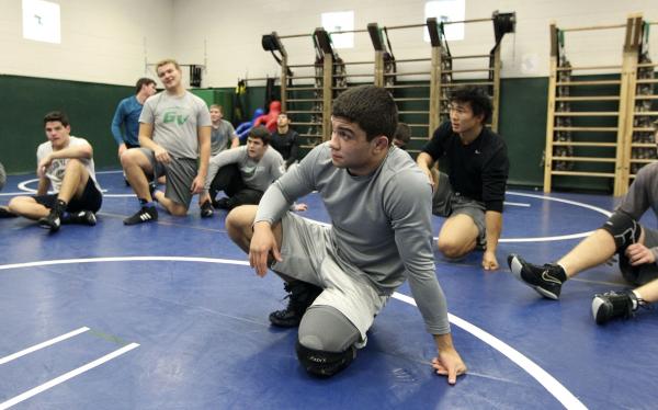 Green Valley’s Donovan Peek, front, listens to instructions during practice. Peek was ...