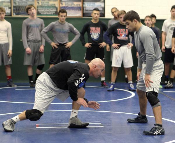 Green Valley’s Donovan Peek, right, works out with coach Jon Ferry during the team&#82 ...