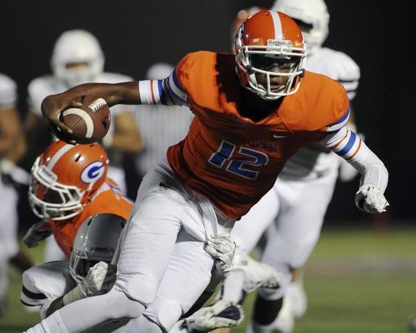 Bishop Gorman quarterback Randall Cunningham, seen carrying the ball against Crespi (Calif.) ...