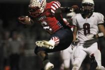 Liberty’s Niko Kapeli, seen scoring a touchdown against Coronado, is one of eight play ...