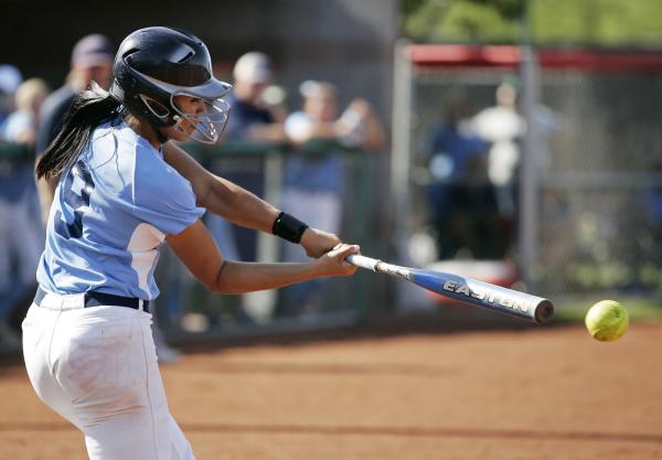 Centennial’s Savannah Horvath connects for a single in the third inning.