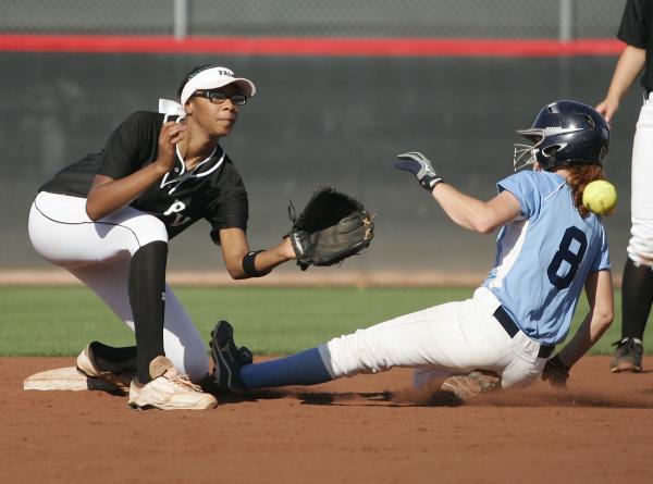 Palo Verde’s Dejanae Gage waits for a throw as Centennial’s Alyssa Finger slides ...