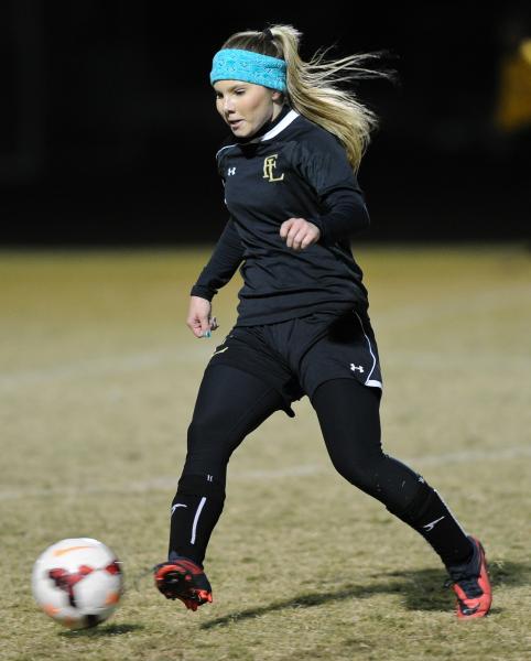 Faith Lutheran’s Dani Tharaldson controls the ball in her team’s match against T ...