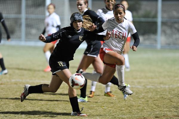 Faith Lutheran’s Tierney Tomburo, front, tries to fend off Tech’s Lisette Fuente ...