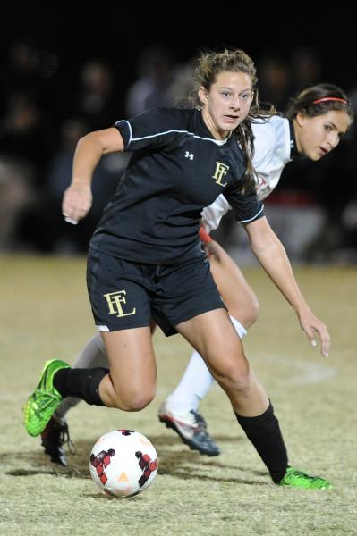 Faith Lutheran’s Charlotte Vancura looks to pass the ball during Wedndesday’s Di ...