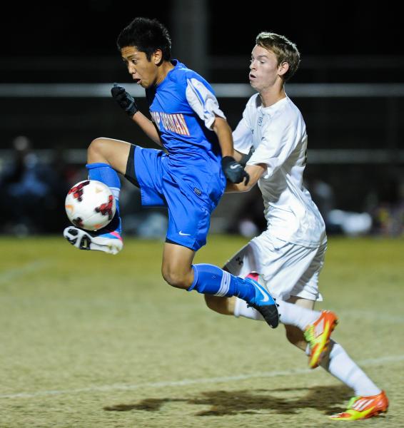 Bishop Gorman’s Cobi DeLeon (15) controls the ball in front of Palo Verde’s Grif ...