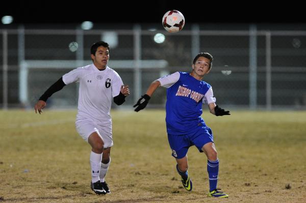 Bishop Gorman’s Jake Bickford (18) looks to control the ball against Palo Verde’ ...