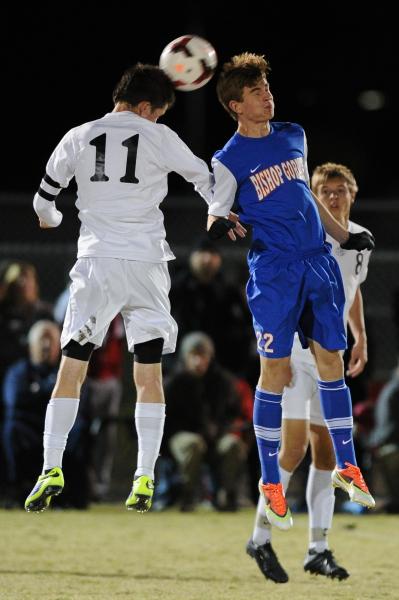 Bishop Gorman’s Jason Roberts (22) goes for the ball against Palo Verde’s Austin ...