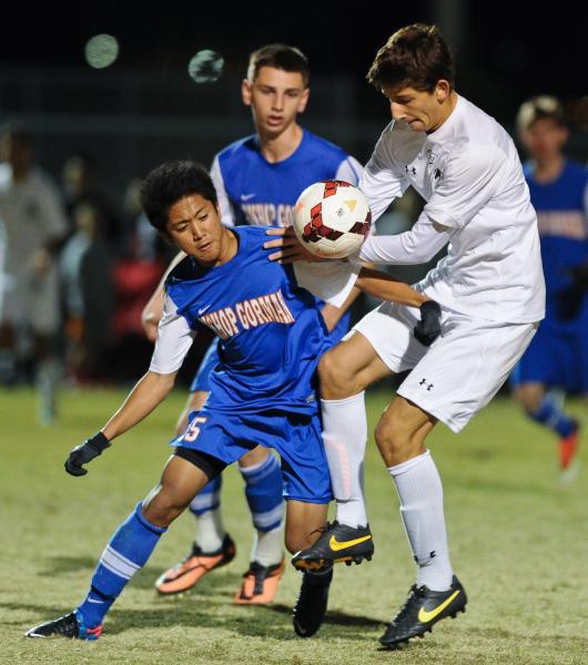 Bishop Gorman’s Cobi DeLeon (15) battles for control against Palo Verde’s Will C ...