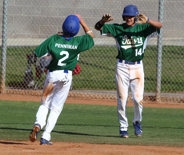 Green Valley’s Jarod Penniman, left, and Keola Paragas celebrate after scoring in the ...