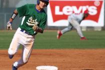 Keola Paragas runs to third base on Jarod Penniman’s fifth-inning single, Green Valley ...