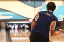 Centennial’s Garrett Page reacts after scoring a strike during team play against Green ...