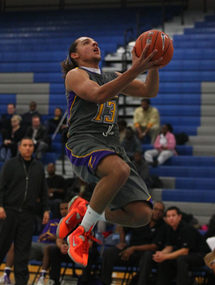 Durango’s Paris Estrada jumps for a shot against Canyon Springs during a basketball ga ...