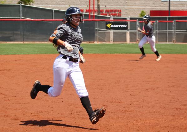 Centennial’s Kate Rauskin delivers a pitch during the state championship game.