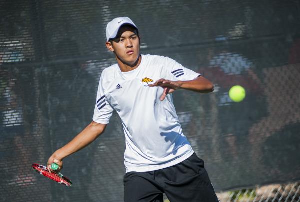 Clark’s Miko Pasimio prepares to hit a forehand.